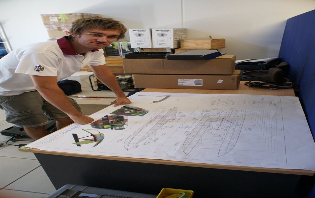 Tom Barry-Cotter, Maritimo Offshore Race Team’s #1 driver, with the comprehensive plans for the cockpit safety enhancements.  © Bob Wonders